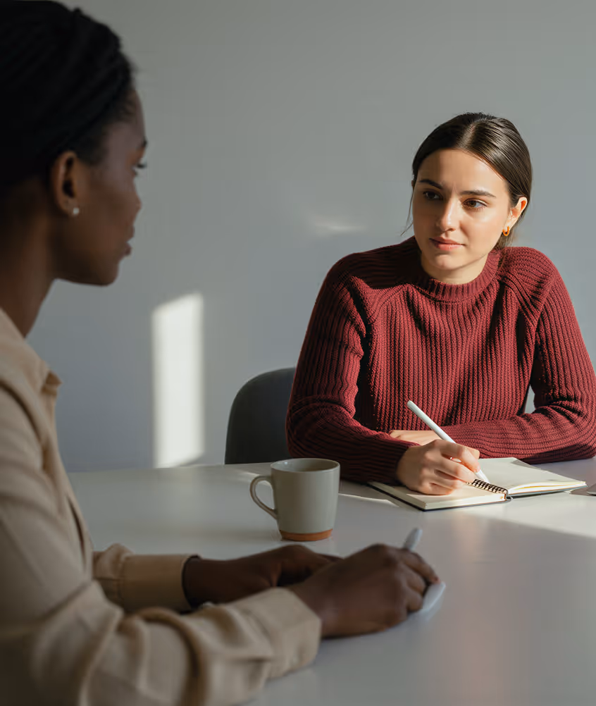 A physician and patient having a considered conversation.